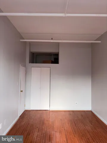 a kitchen with a stove and a refrigerator