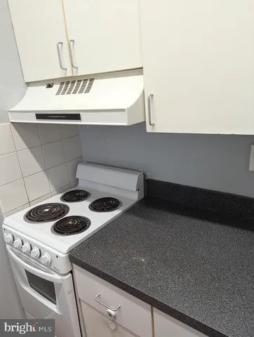 a bathroom with a toilet and a sink