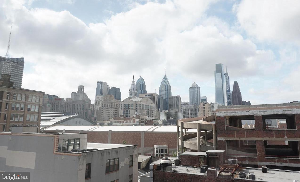 1010 Race Street, Unit 6K Philadelphia, PA 19107 - Photo 17 of 17 a view of a city with tall buildings