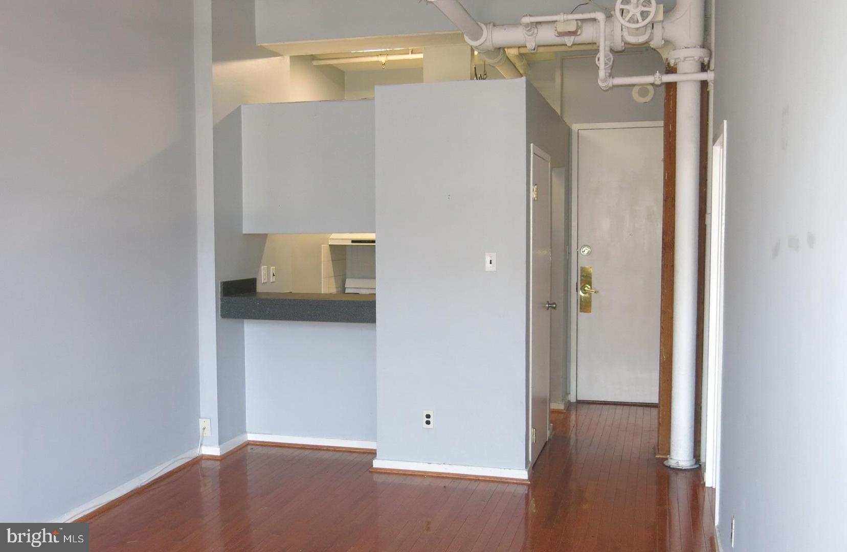 1010 Race Street, Unit 6K Philadelphia, PA 19107 - Photo 5 of 17 a bathroom with a shower and a sink