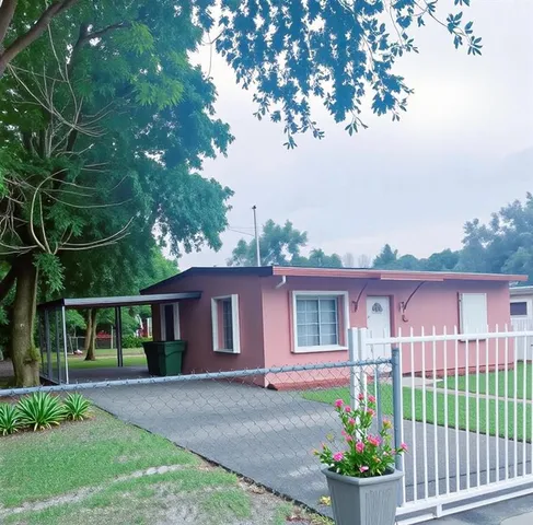 a view of a patio with couches table and chairs under an umbrella