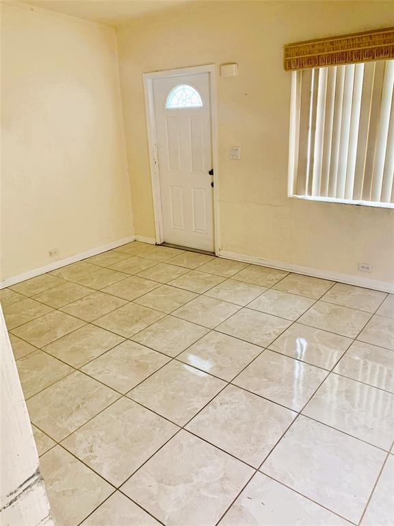 12225 Northwest 17th Avenue North Miami, FL 33167 - Photo 7 of 19 a view of an empty room and window