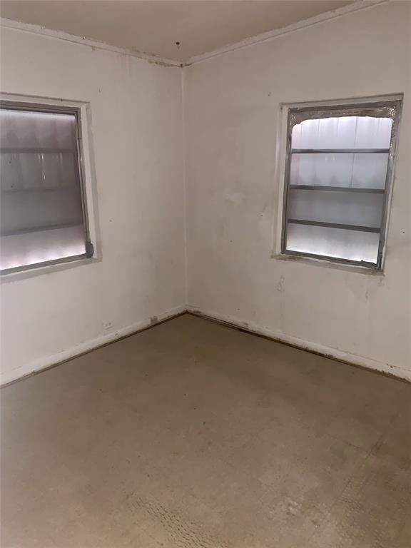 12225 Northwest 17th Avenue North Miami, FL 33167 - Photo 9 of 19 an empty room with a bench