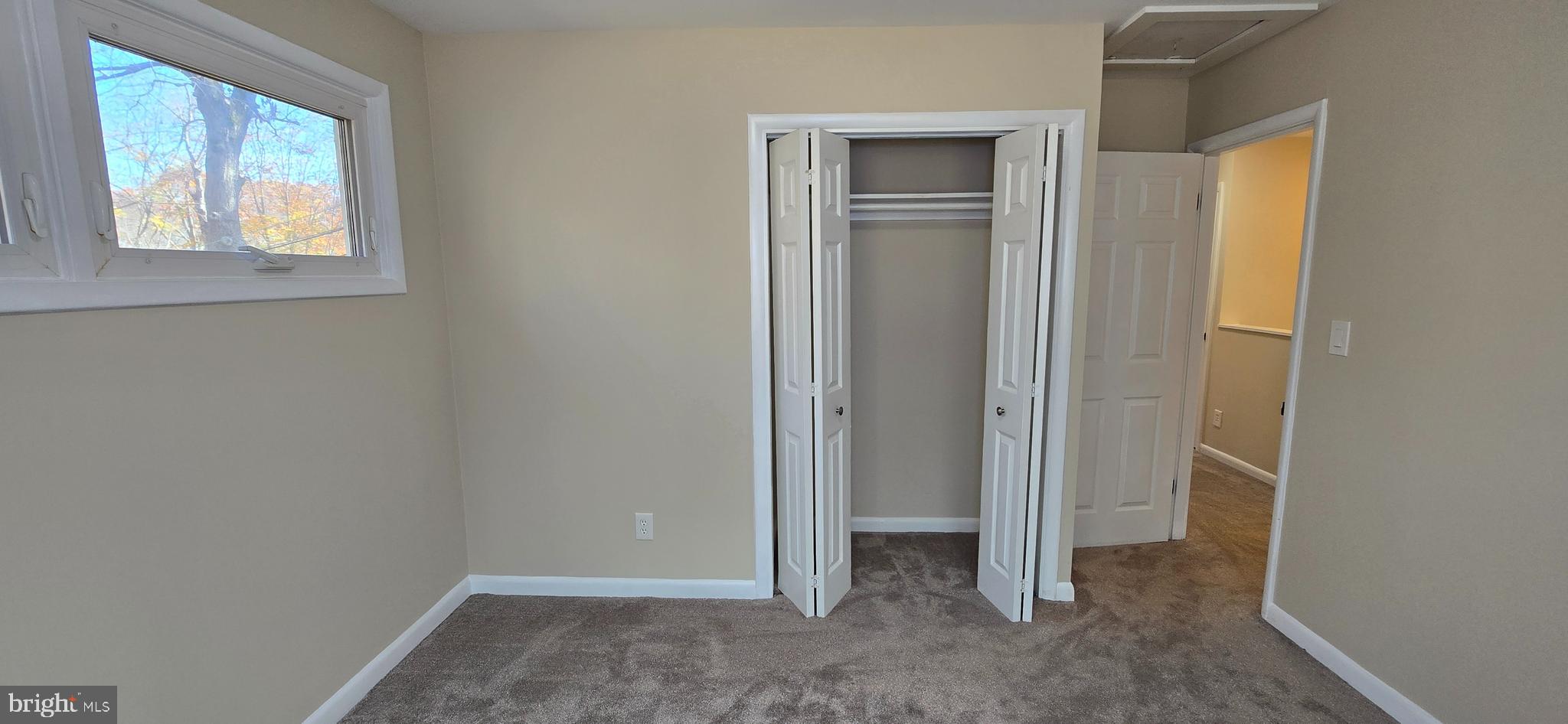 7613 Locust Lane Fort Washington, MD 20744 - Photo 32 of 49 an empty room with windows and closet