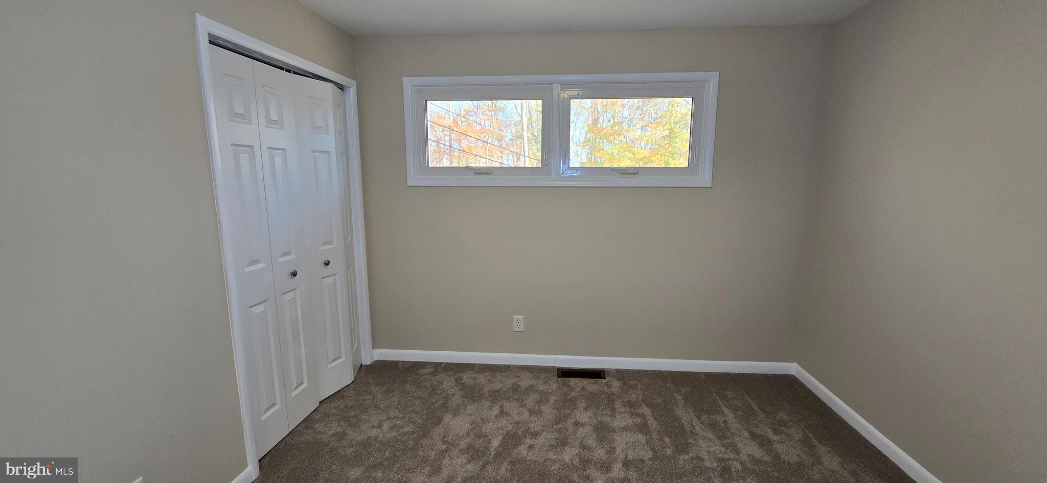 7613 Locust Lane Fort Washington, MD 20744 - Photo 35 of 49 an empty room with windows