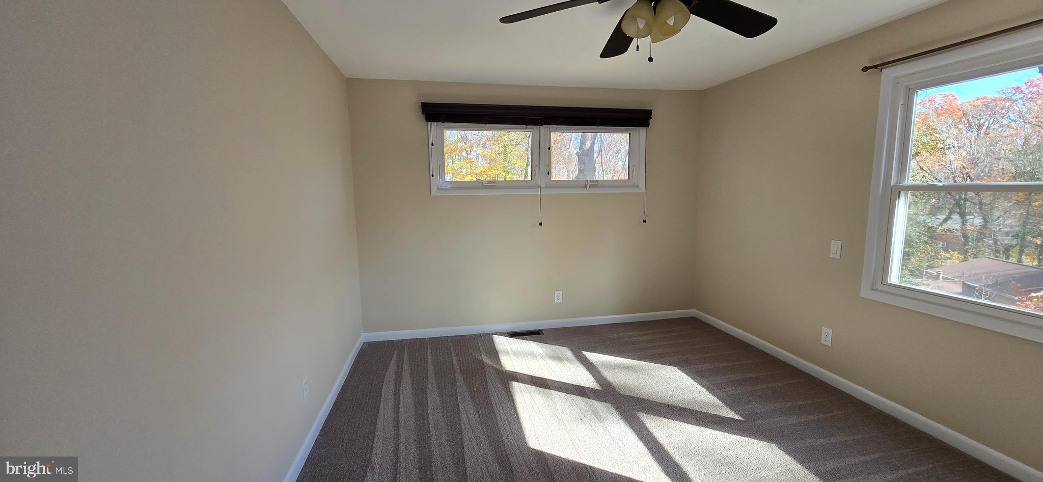 7613 Locust Lane Fort Washington, MD 20744 - Photo 37 of 49 wooden floor in an empty room with a window