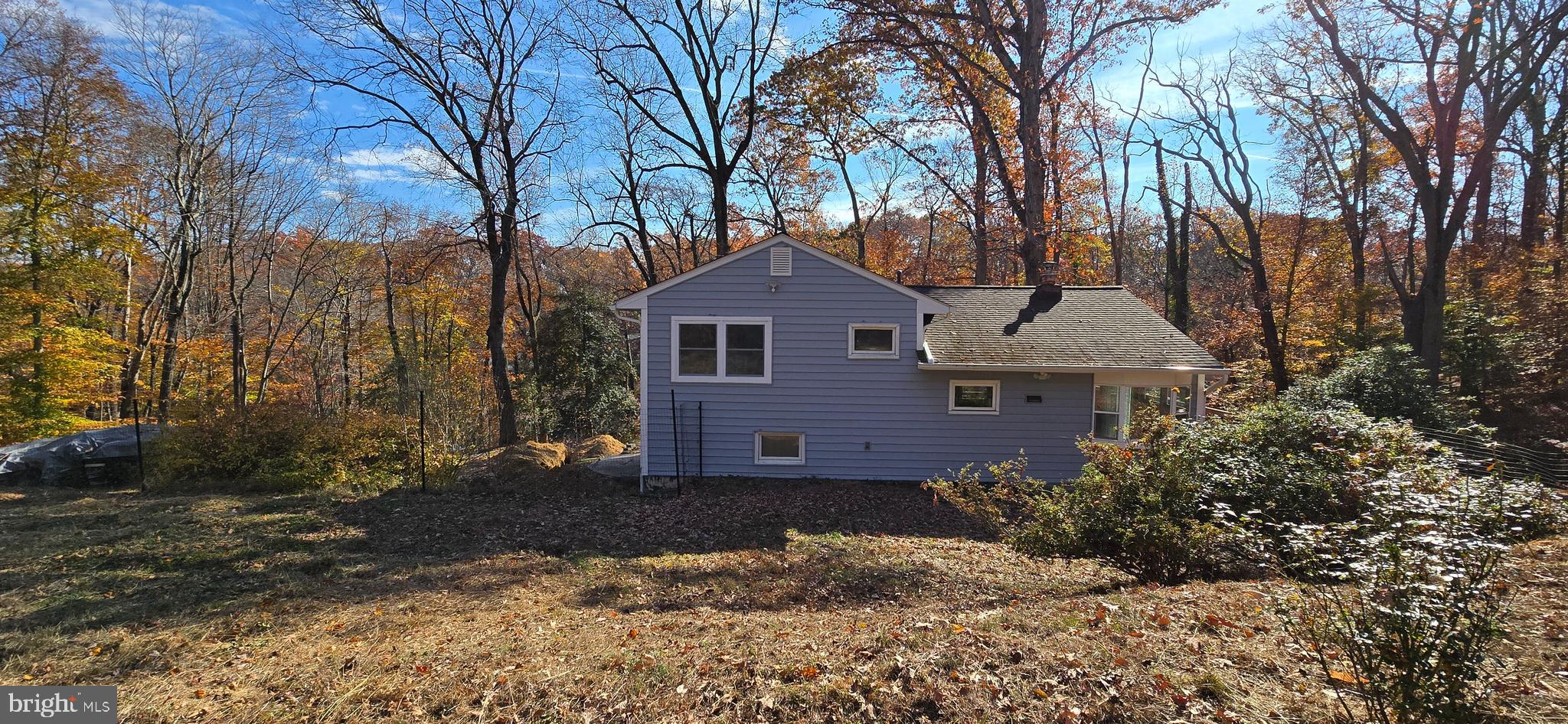 7613 Locust Lane Fort Washington, MD 20744 - Photo 4 of 49 a front view of a house with a yard