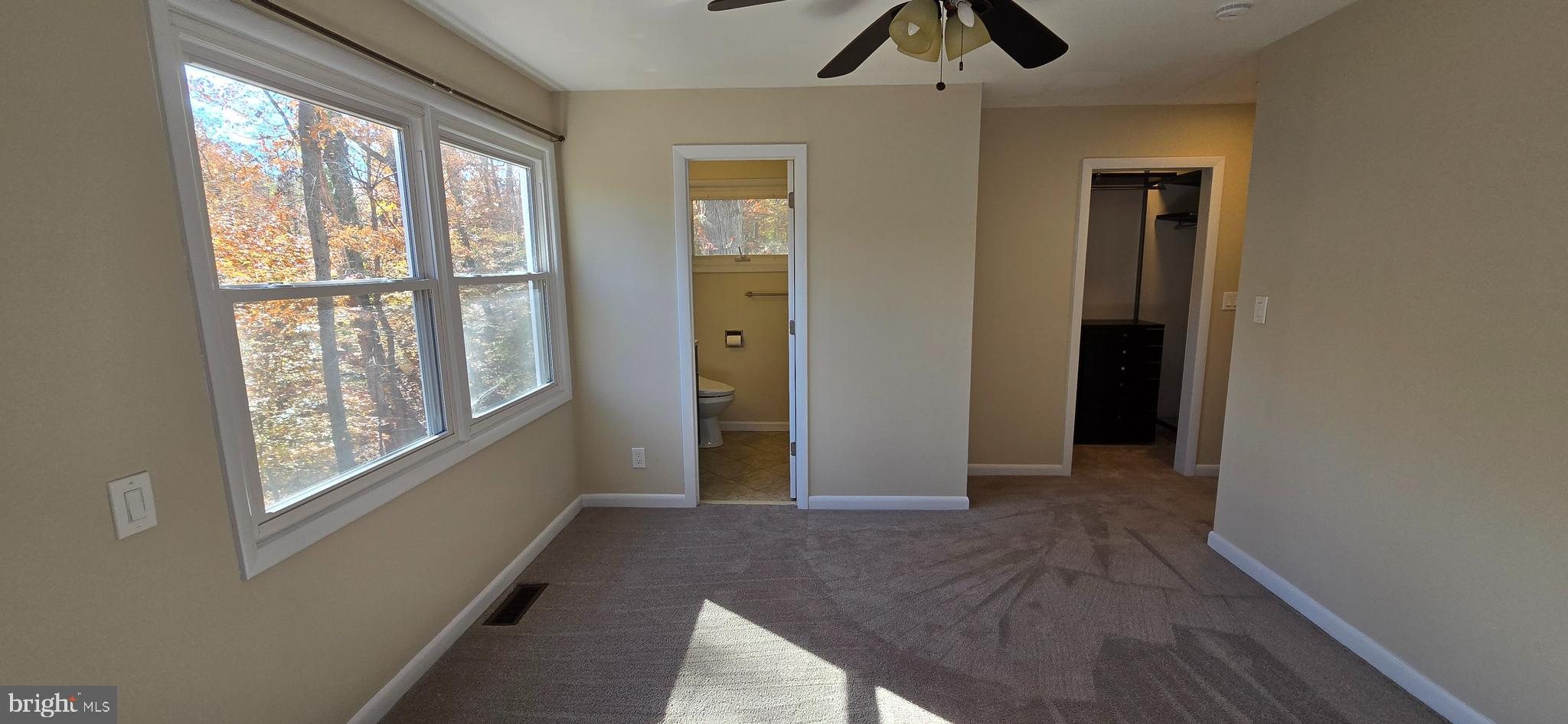 7613 Locust Lane Fort Washington, MD 20744 - Photo 41 of 49 a view of an empty room with window and wooden floor