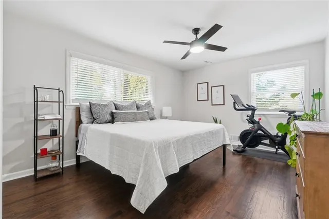 a bedroom with a bed furniture and a window