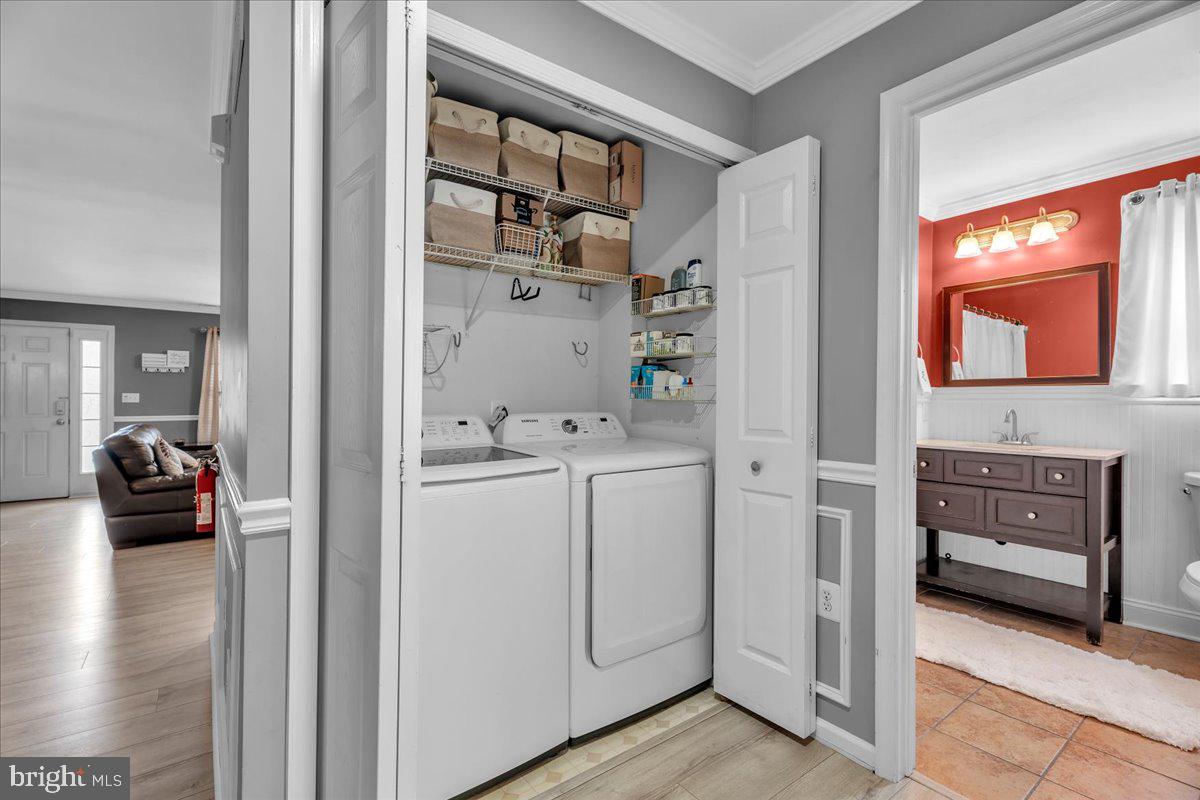 207 Redbud Lane, Unit 207 Mantua, NJ 08051 - Photo 13 of 22 a utility room with closet dryer and washer
