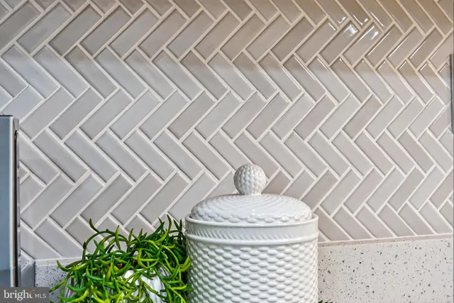 a view of entryway with brick walls