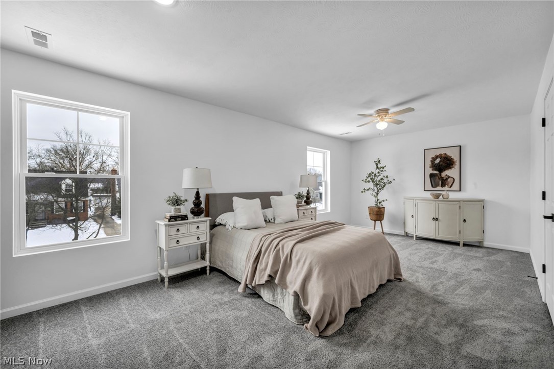 3670 Pennington Road Cleveland, OH 44120 - Photo 13 of 28 Bedroom featuring carpet flooring and ceiling fan