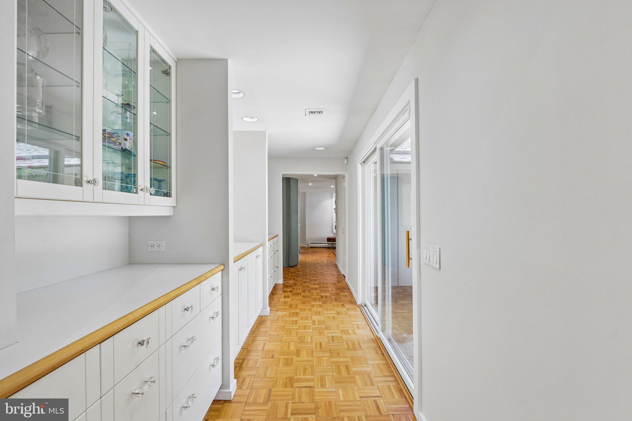 1673 Paper Mill Road Jenkintown, PA 19046 - Photo 17 of 73 a view of a hallway with wooden floor and staircase
