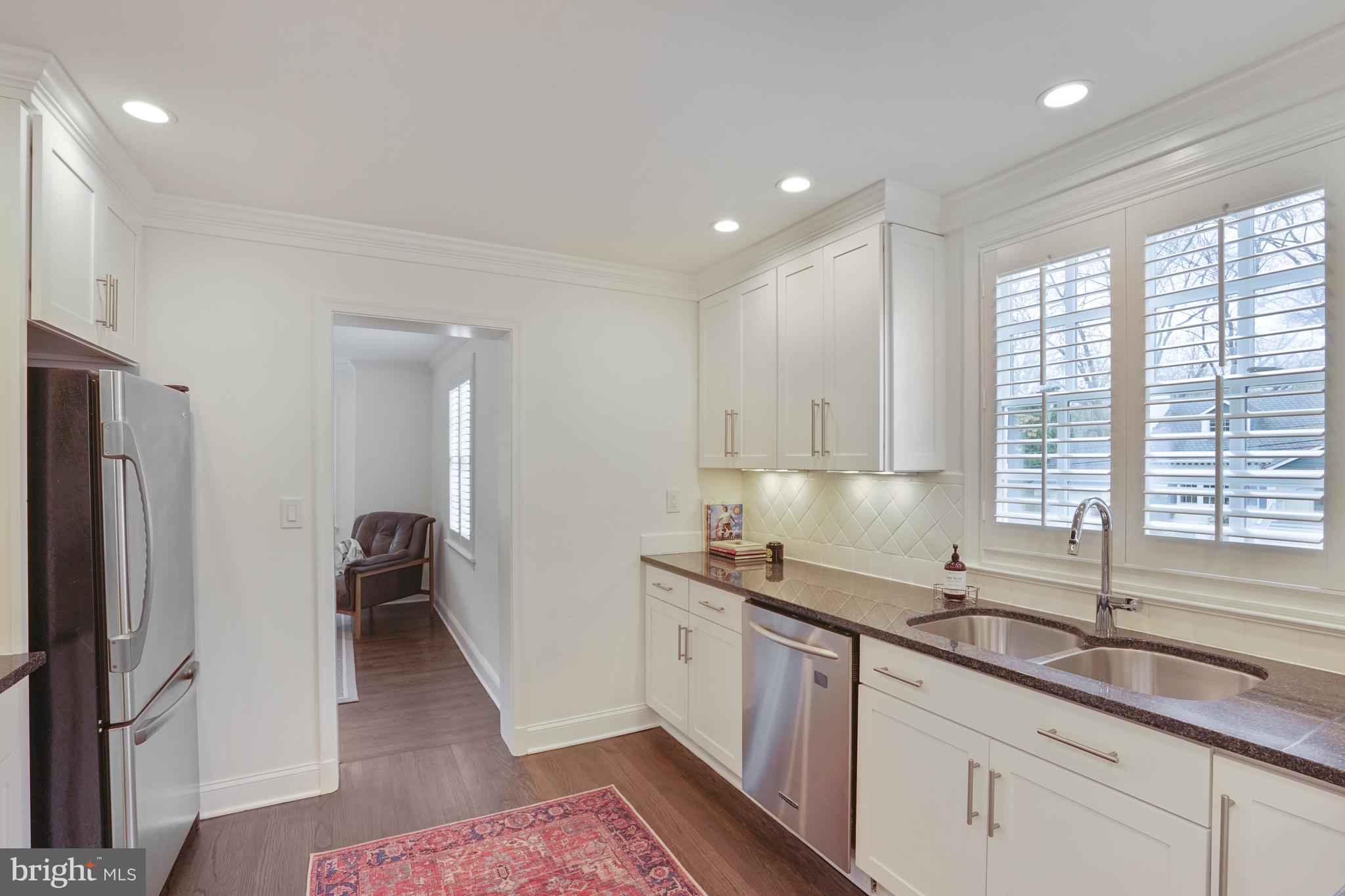 4603 Tournay Road Bethesda, MD 20816 - Photo 10 of 26 Kitchen to Family Room