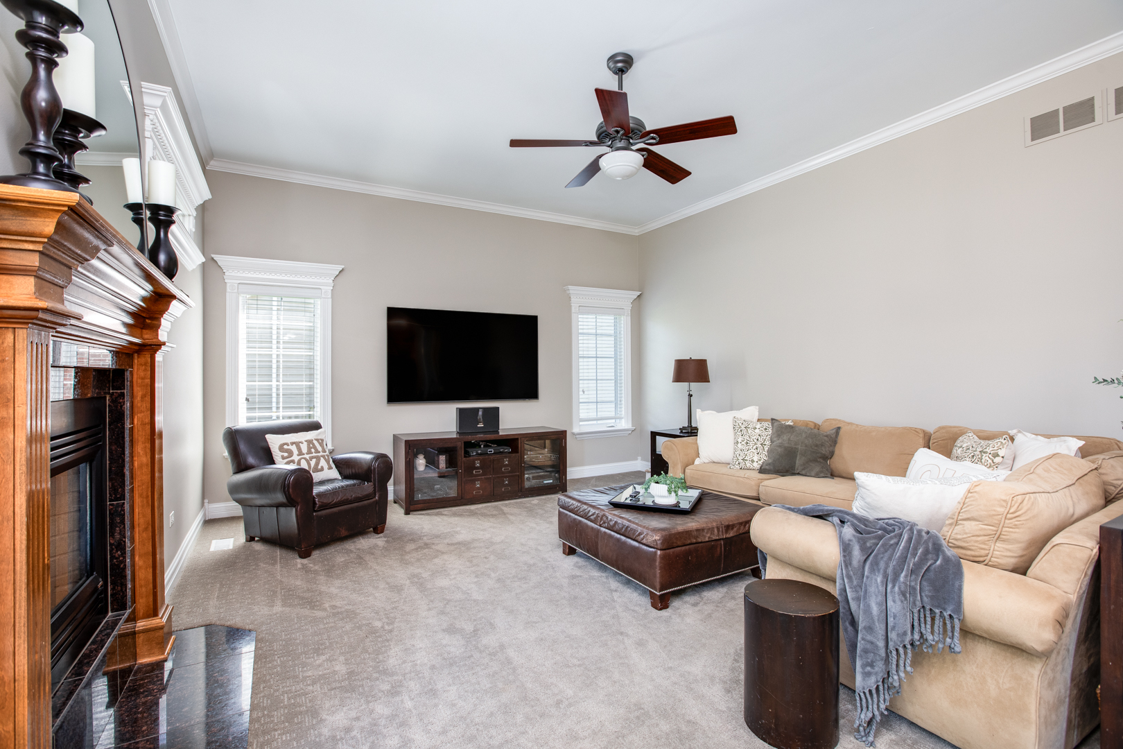 3976 Bluejay Lane Naperville, IL 60564 - Photo 11 of 34 a living room with furniture and a flat screen tv