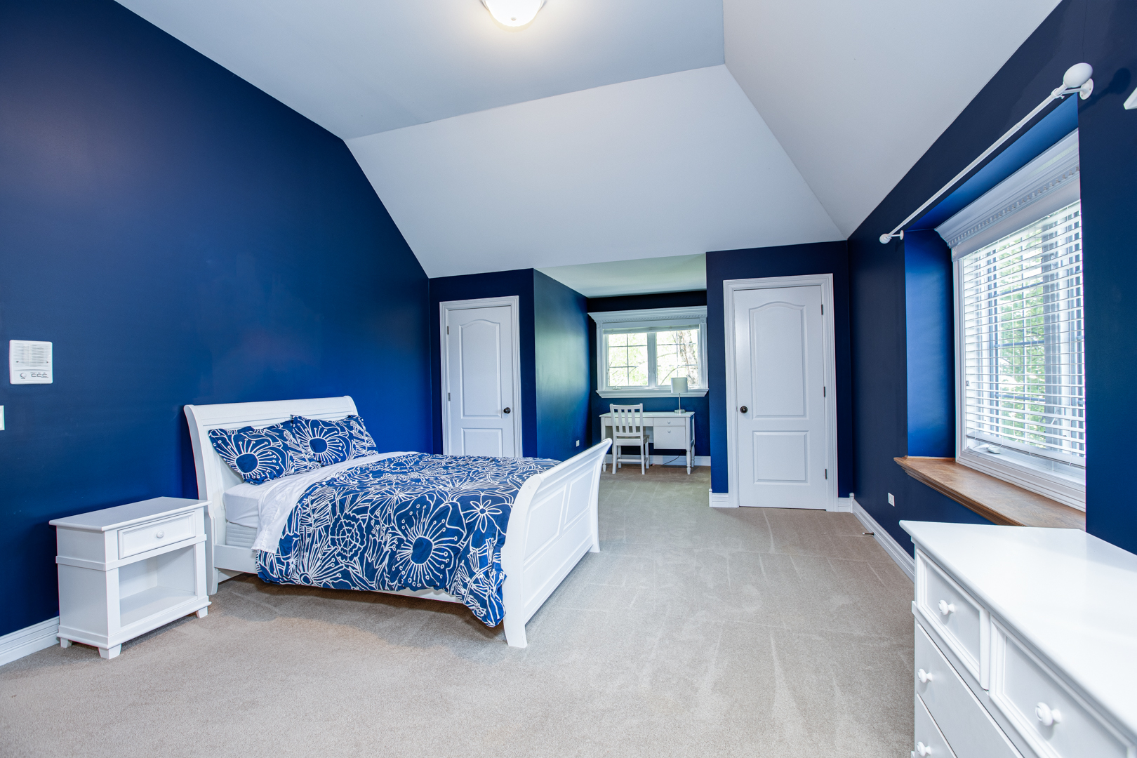 3976 Bluejay Lane Naperville, IL 60564 - Photo 21 of 34 a bedroom with a bed and a large window