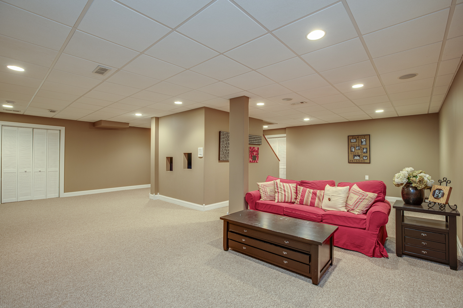 3976 Bluejay Lane Naperville, IL 60564 - Photo 26 of 34 a spacious bedroom with a bed and a couch