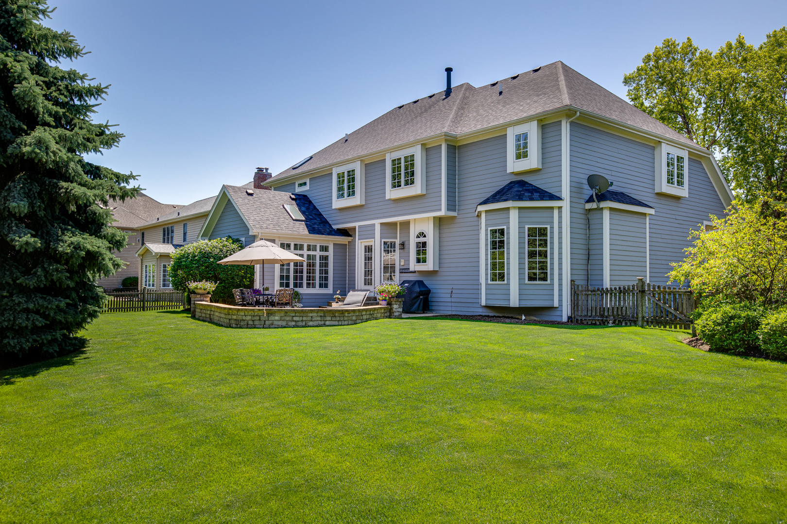 3976 Bluejay Lane Naperville, IL 60564 - Photo 28 of 34 a front view of a house with a garden