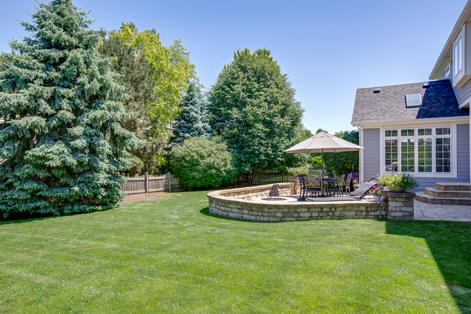 3976 Bluejay Lane Naperville, IL 60564 - Photo 29 of 34 a view of house with backyard and outdoor seating