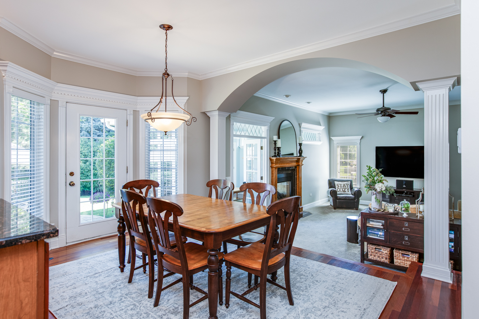 3976 Bluejay Lane Naperville, IL 60564 - Photo 10 of 34 a view of a dining room with furniture window and wooden floor