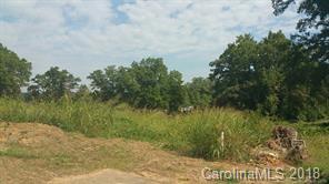 27 Goodson Place Southwest, Unit 36 Concord, NC 28027 - Photo 1 of 1 a view of a lush green space