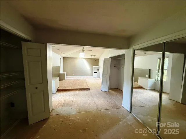 a bathroom with a shower and a sink