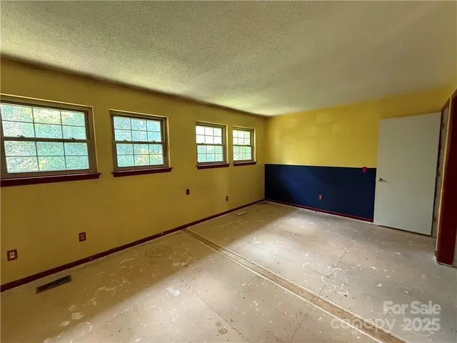 a bathroom with a toilet and a sink