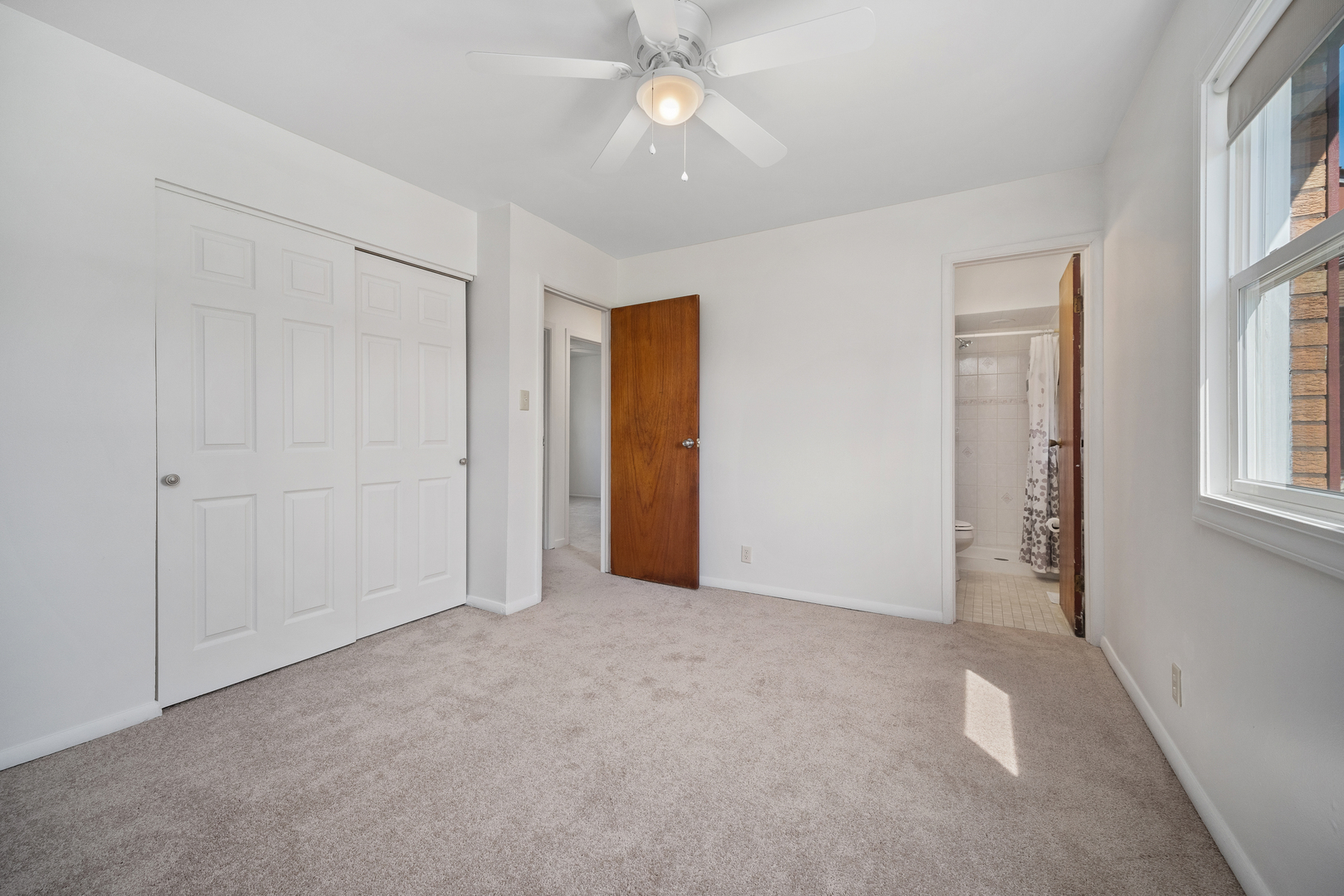 149 Mellbrook Road Bolingbrook, IL 60440 - Photo 13 of 17 wooden floor in an empty room with a window