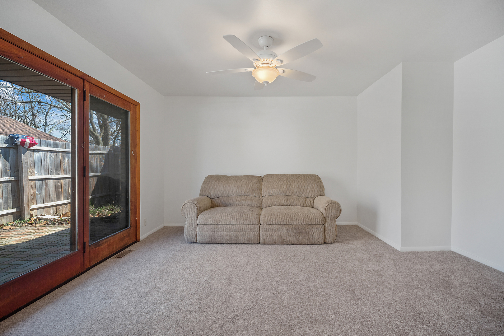 149 Mellbrook Road Bolingbrook, IL 60440 - Photo 5 of 17 a living room with furniture and a large window