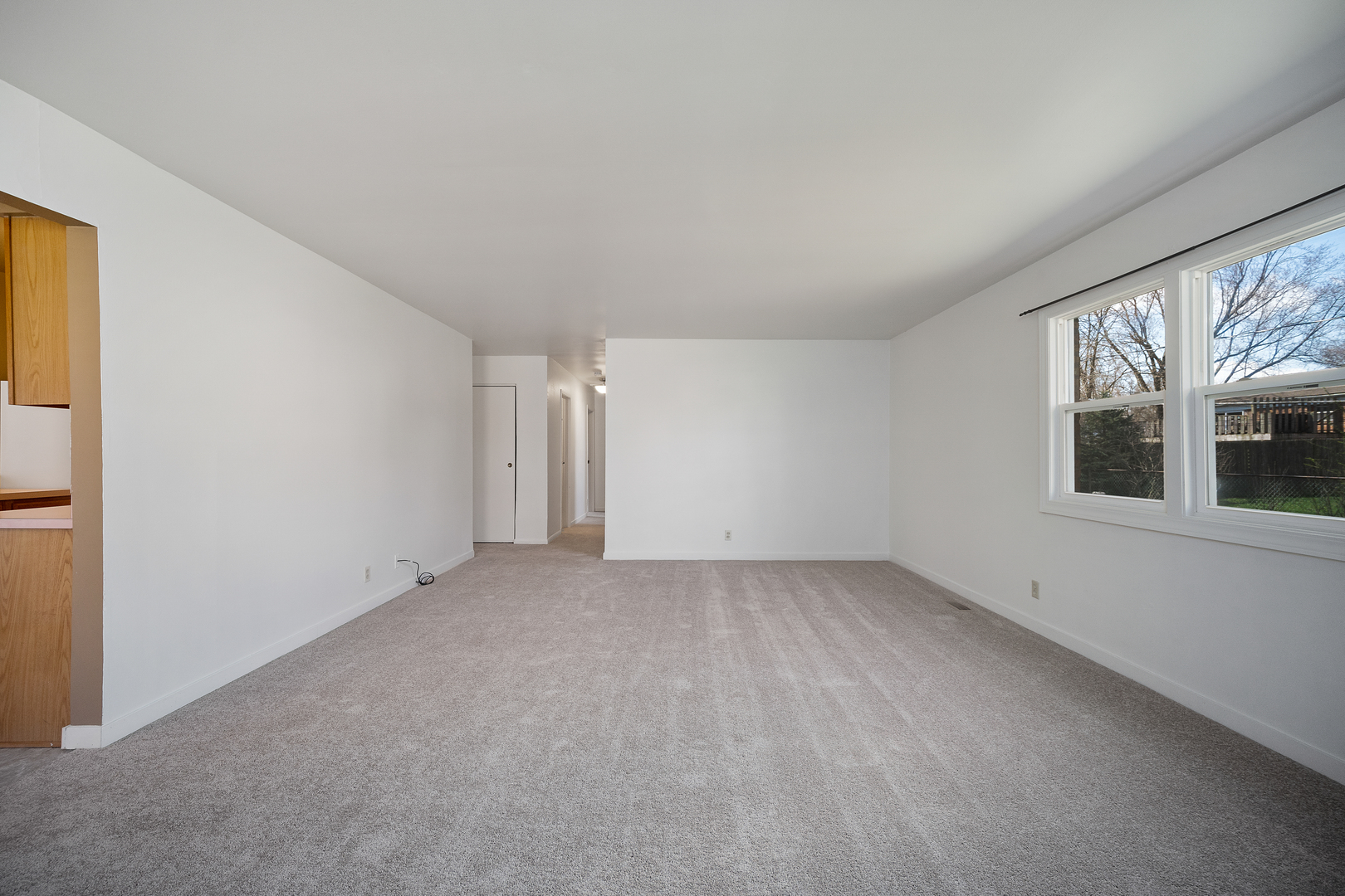149 Mellbrook Road Bolingbrook, IL 60440 - Photo 7 of 17 a view of an empty room with a window