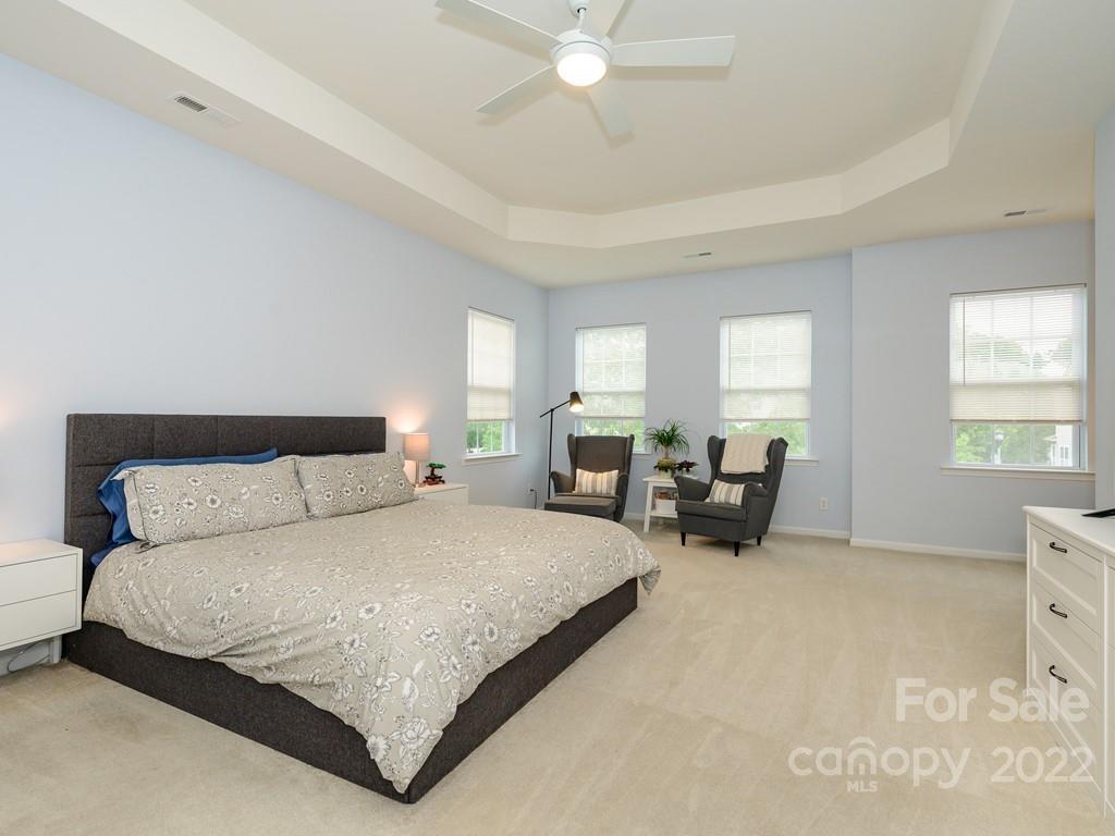 8421 Cotton Press Road Charlotte, NC 28277 - Photo 31 of 40 a large bedroom with a bed and window