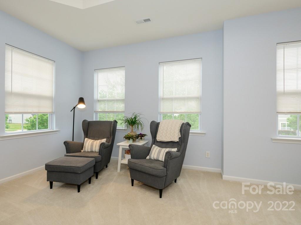8421 Cotton Press Road Charlotte, NC 28277 - Photo 33 of 40 a living room with furniture and a window