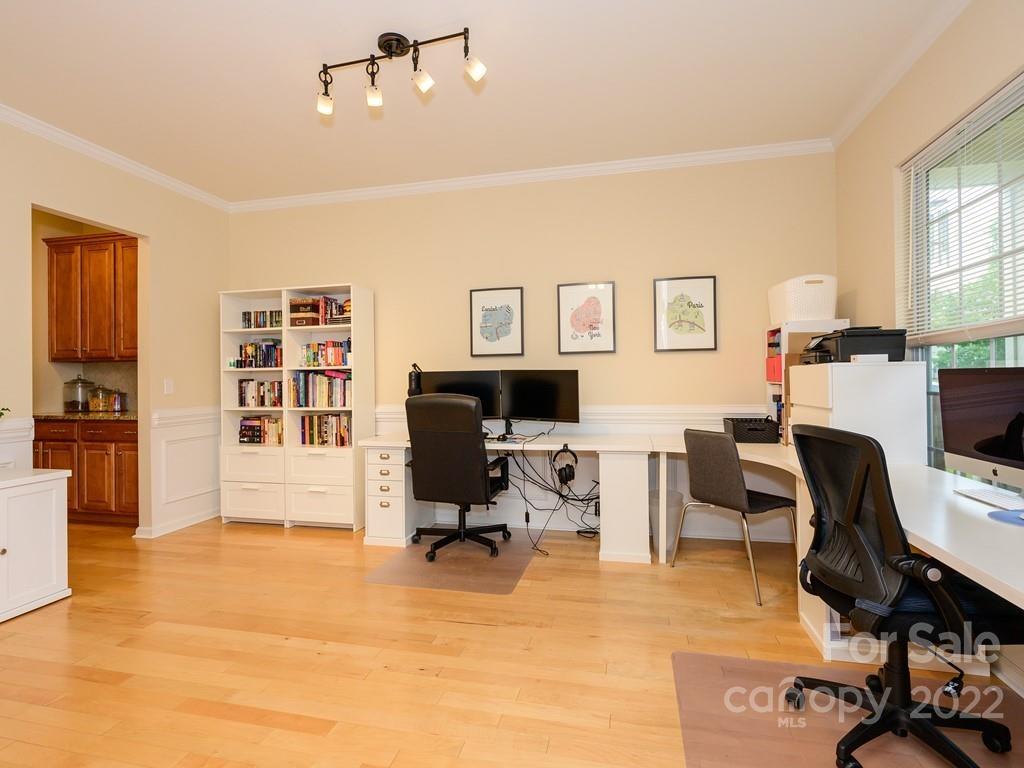 8421 Cotton Press Road Charlotte, NC 28277 - Photo 7 of 40 a view of a livingroom with workspace and a window