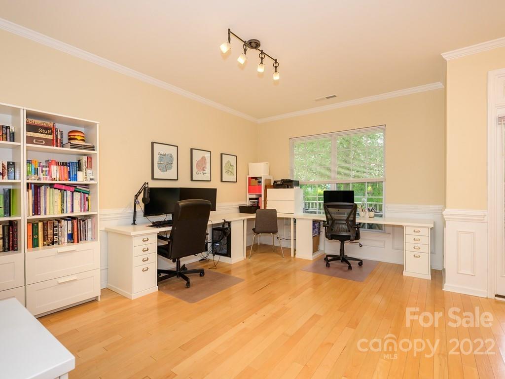 8421 Cotton Press Road Charlotte, NC 28277 - Photo 8 of 40 a view of a workspace with furniture and a window