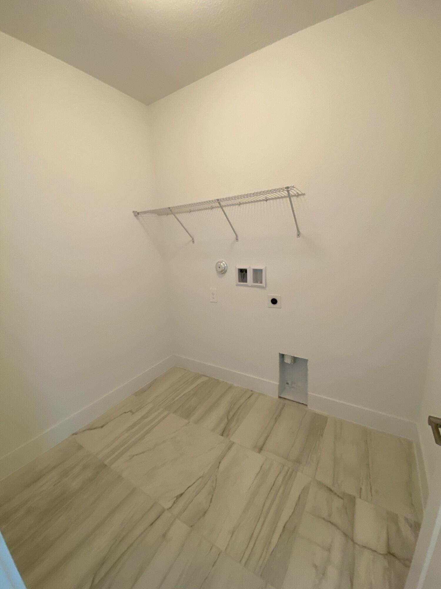 7100 Southeast Park Trace Stuart, FL 34997 - Photo 15 of 15 PPT 29 laundry room