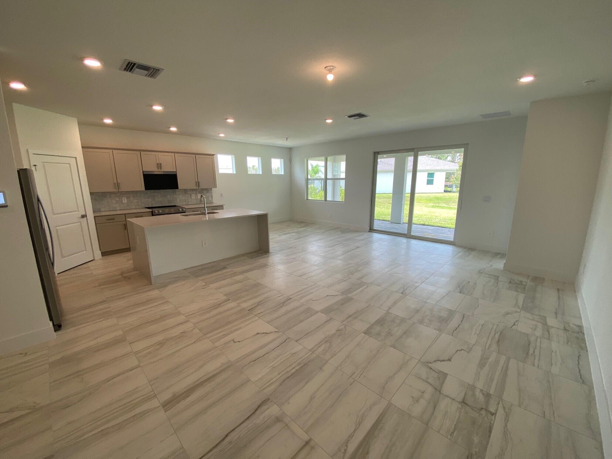 7100 Southeast Park Trace Stuart, FL 34997 - Photo 3 of 15 PPT 29 great room2
