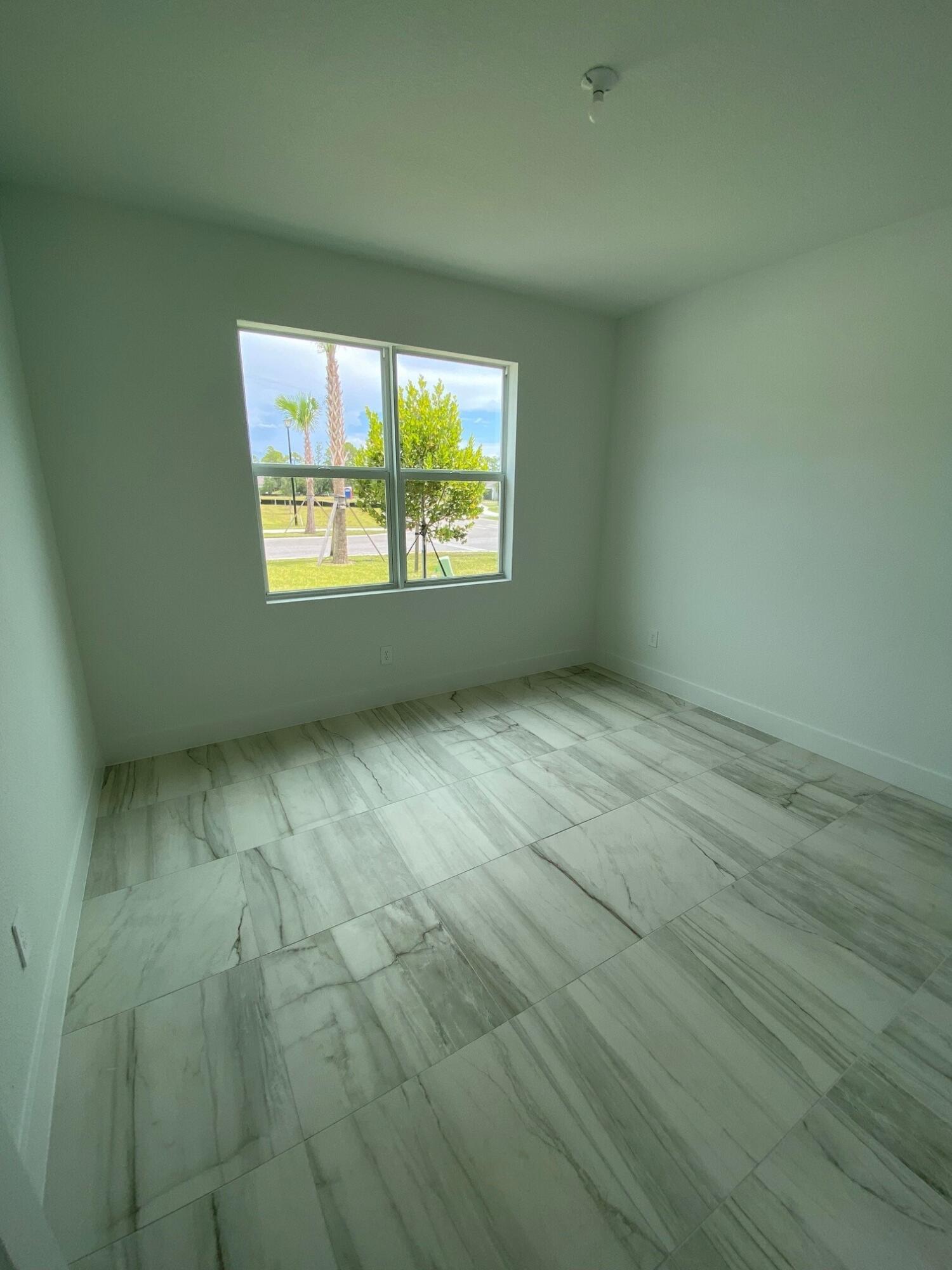7100 Southeast Park Trace Stuart, FL 34997 - Photo 10 of 15 PPT 29 bedroom 2