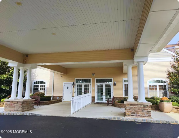 a front view of a building with street view