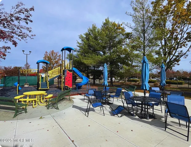 a view of a lake with a house in the background