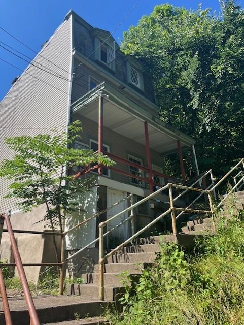 635 Rising Main Avenue Pittsburgh, PA 15212 - Photo 2 of 34 a backyard of a house with lots of green space