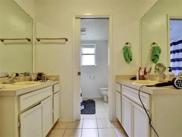 a view of a bathroom with a sink and a toilet