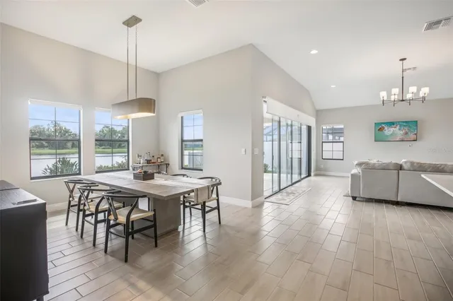 a kitchen with kitchen island granite countertop a sink counter top space stainless steel appliances and cabinets