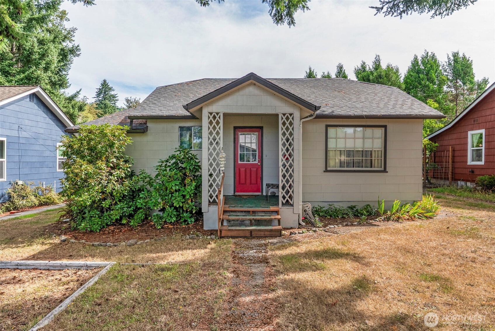 a front view of a house with a yard