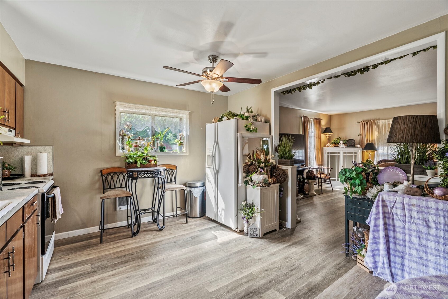 110 Madison Street Ryderwood, WA 98581 - Photo 14 of 30 a view of a livingroom with furniture and a flat screen tv