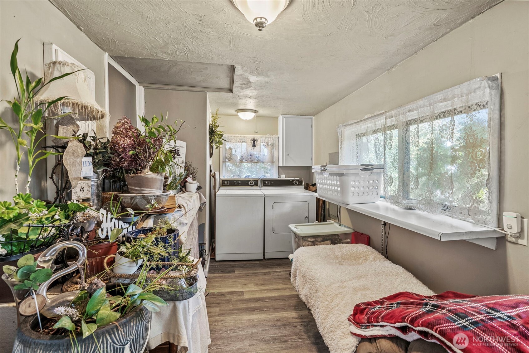 110 Madison Street Ryderwood, WA 98581 - Photo 15 of 30 a kitchen with sink refrigerator and outdoor view