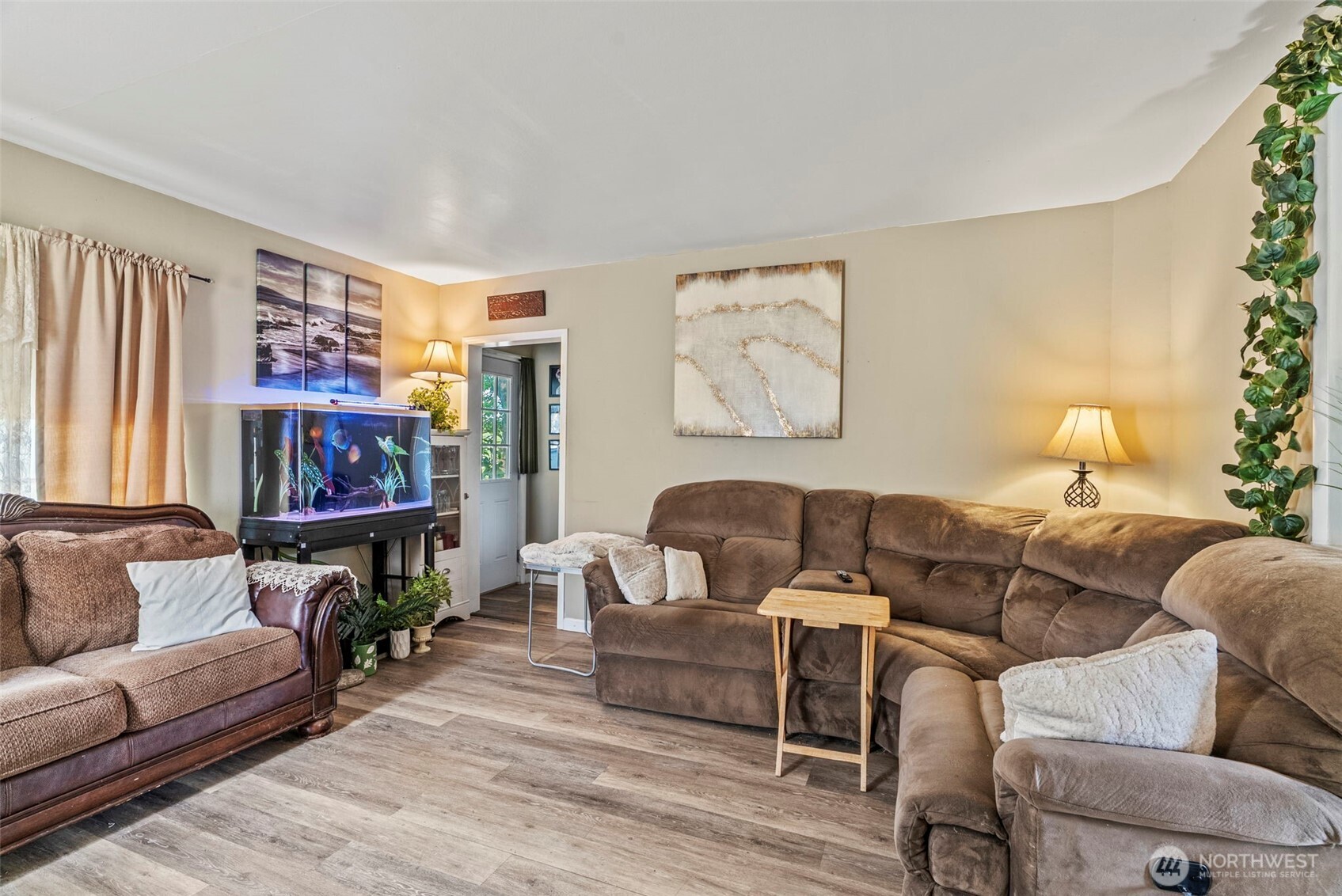 110 Madison Street Ryderwood, WA 98581 - Photo 25 of 30 a living room with furniture and a fireplace
