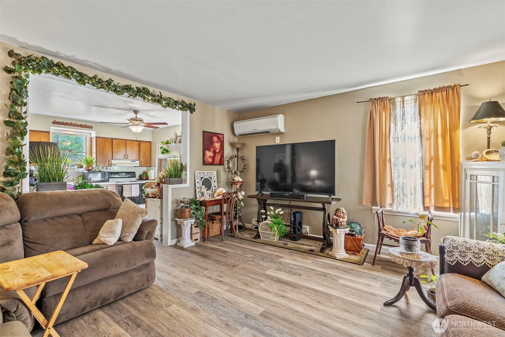 110 Madison Street Ryderwood, WA 98581 - Photo 26 of 30 a living room with furniture and a flat screen tv