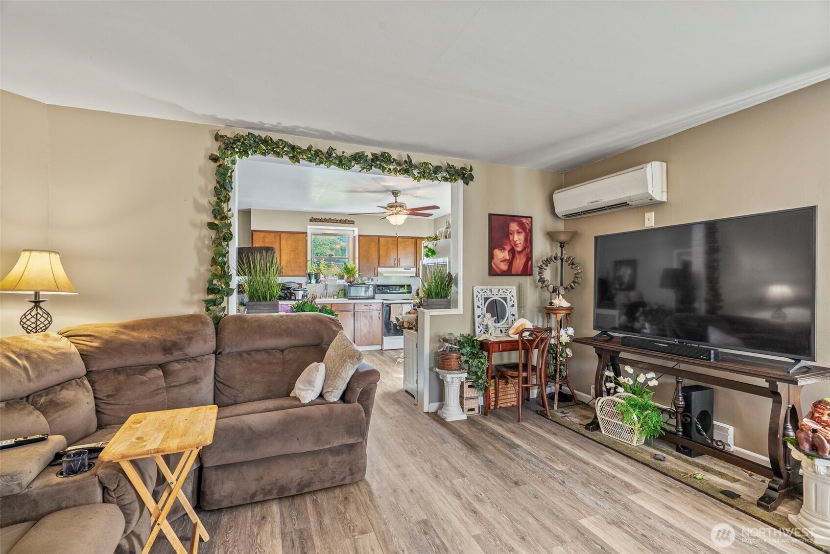 110 Madison Street Ryderwood, WA 98581 - Photo 27 of 30 a living room with furniture and a flat screen tv