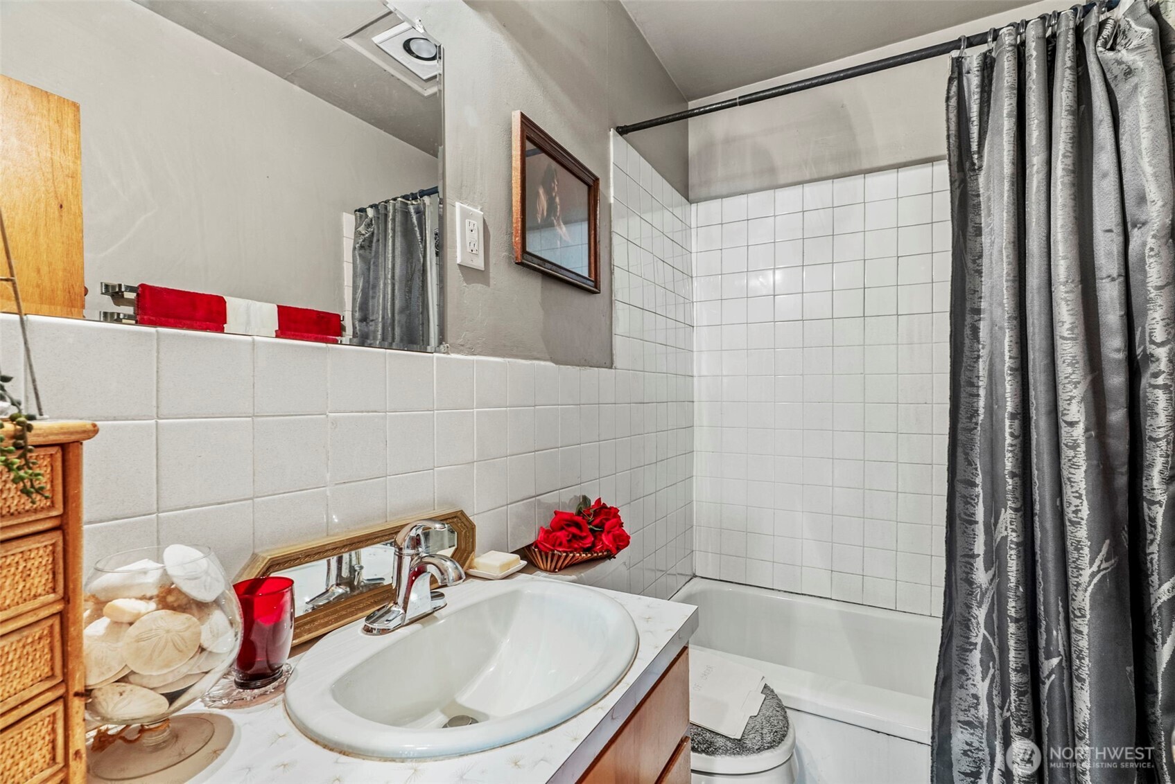 110 Madison Street Ryderwood, WA 98581 - Photo 10 of 30 a bathroom with a sink and a mirror