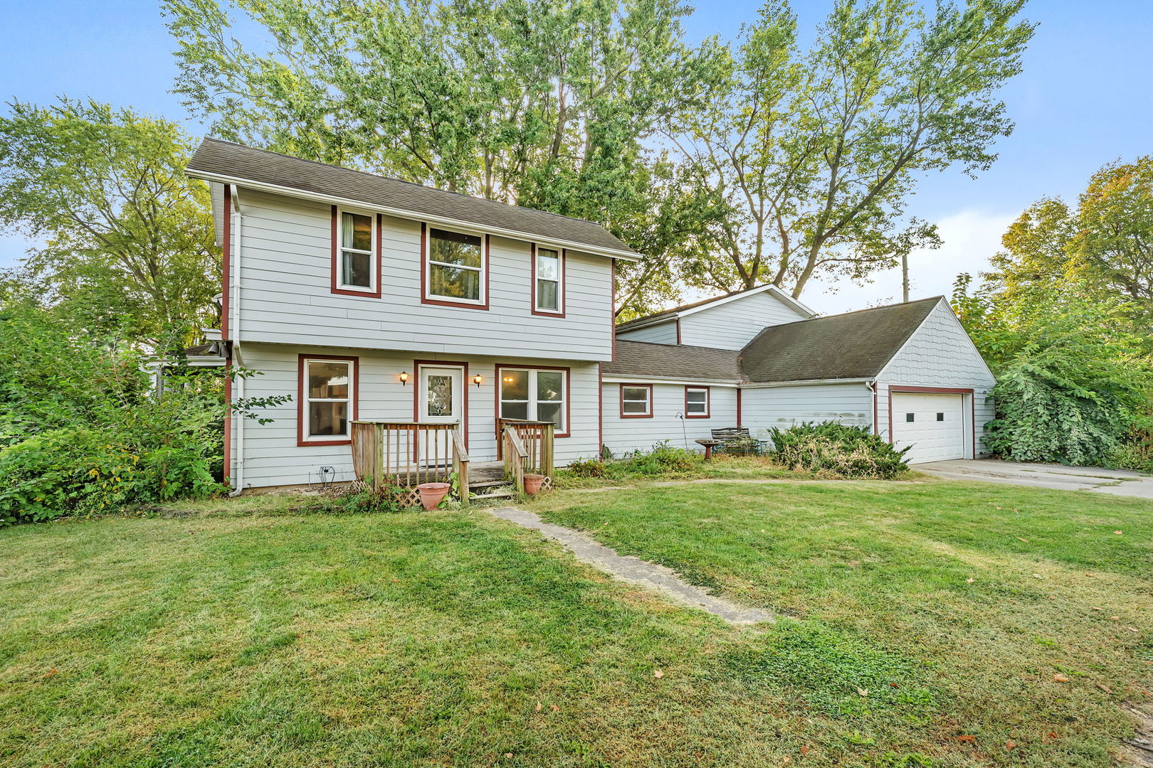 1636 North 4012th Road Earlville, IL 60518 - Photo 1 of 31 a front view of a house with a yard